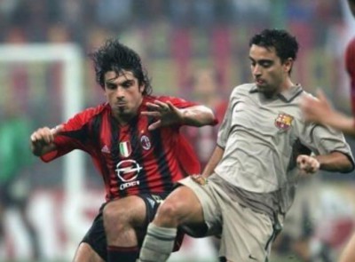 gattuso_y_xavi_en_un_partido_entre_el_ac_milan_y_el_fc_barcelona_foto_efe_001.jpg